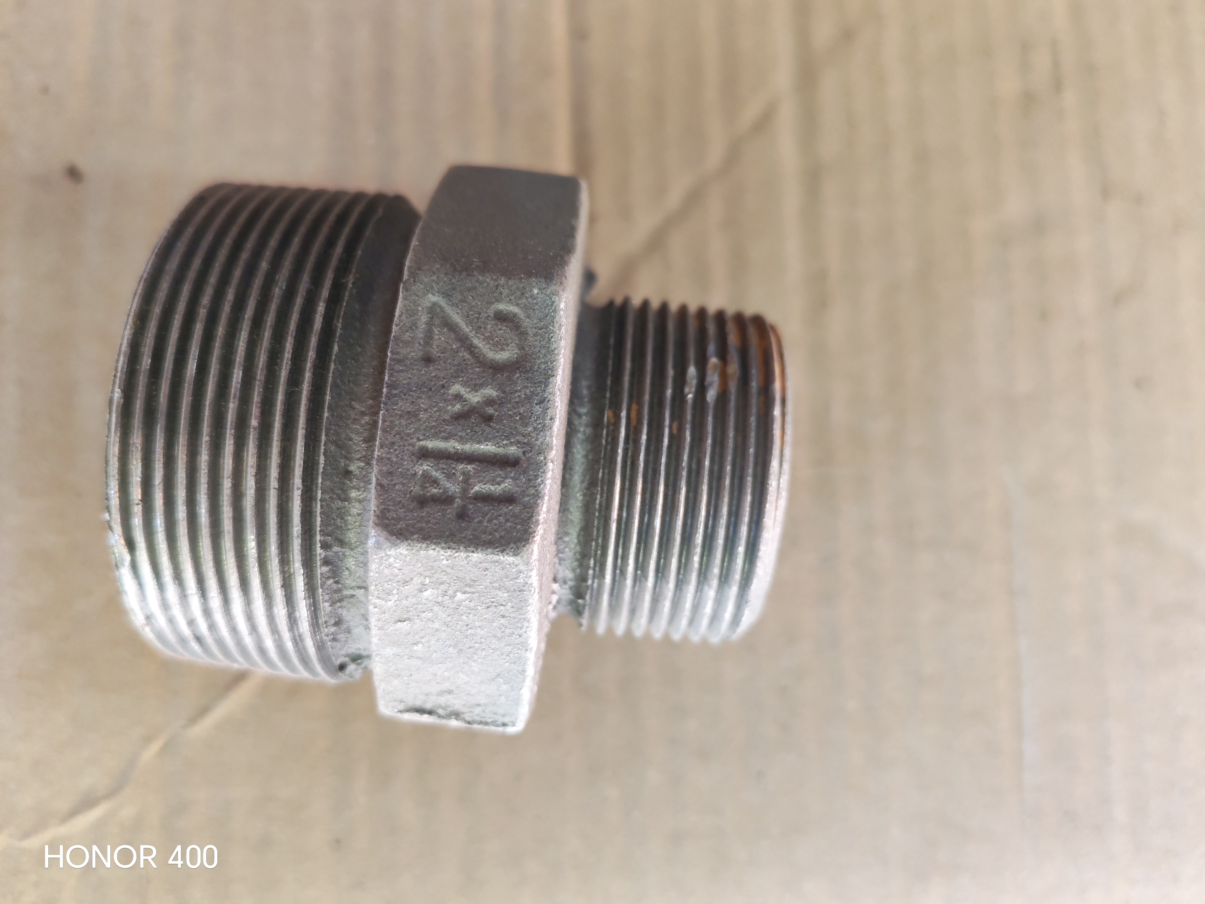 NIPPEL REDUCER THREADED BLACK 2'' X 1 1/4''